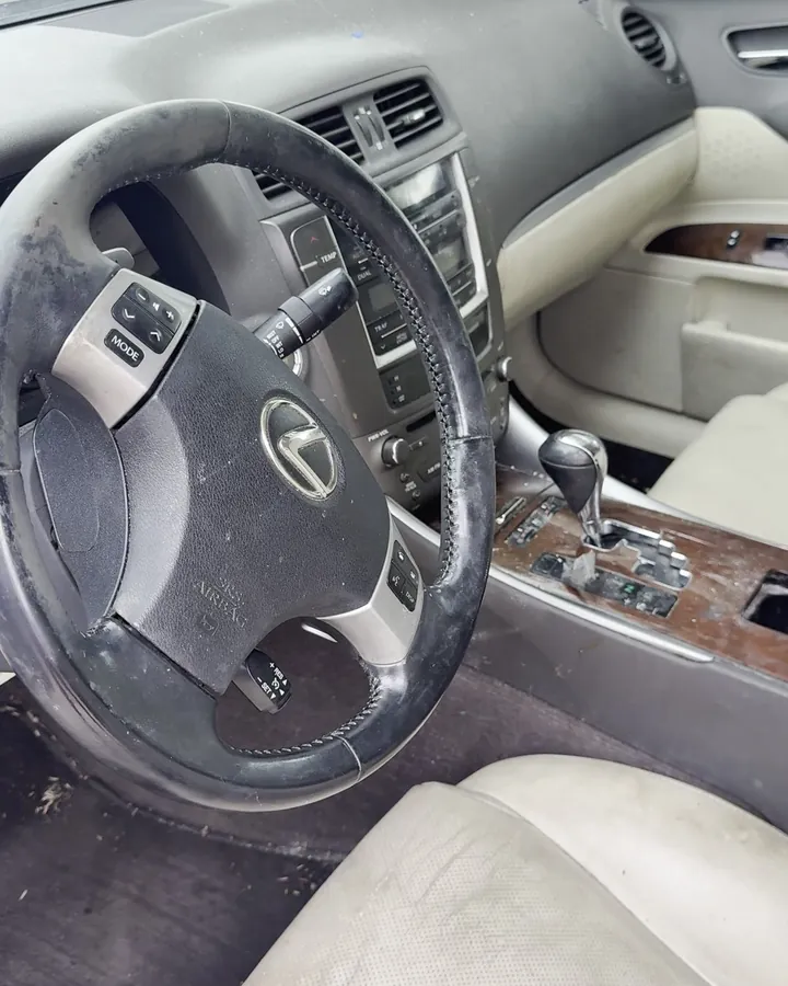 Lexus steering wheel and driver seat before detailing